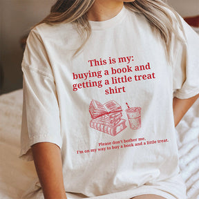 Buying A Book And Getting A Little Treat T-shirt