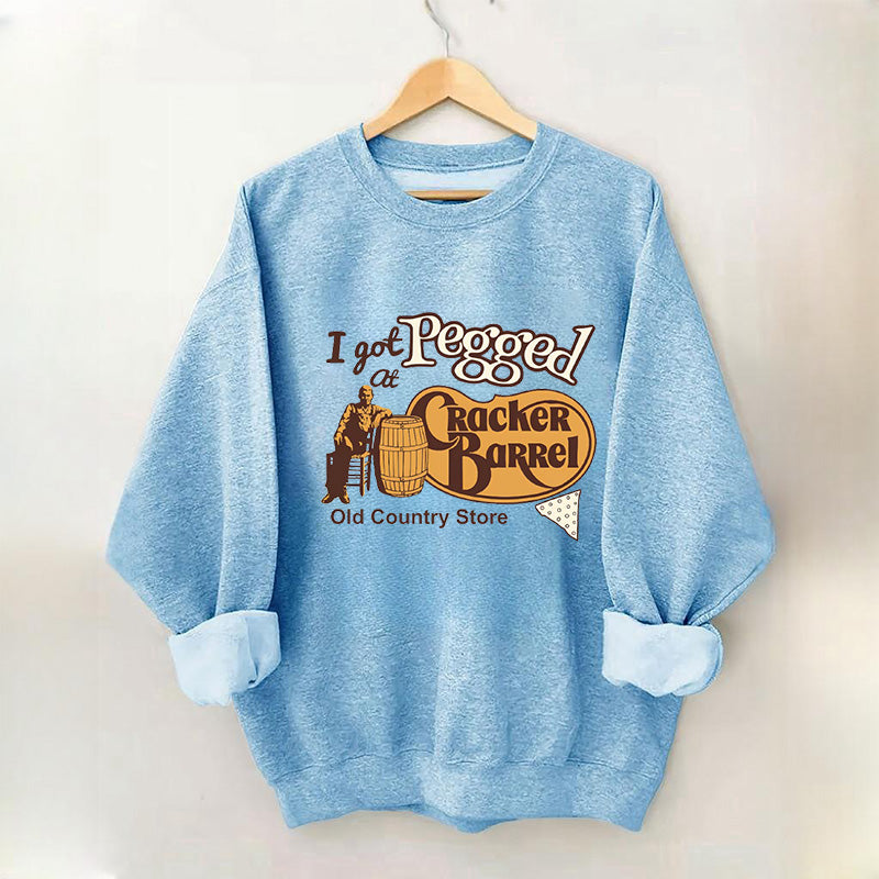 Je me suis fait attacher au sweat-shirt Cracker Barrel Old Country Store