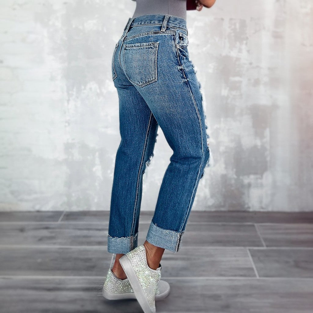 Schmale, zerrissene Jeans mit hoher Taille