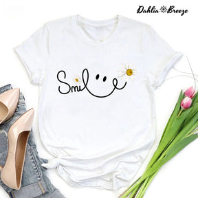 T-shirt visage souriant fleur de marguerite