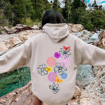 Sweat à capuche Doodle de fleurs aux contours floraux