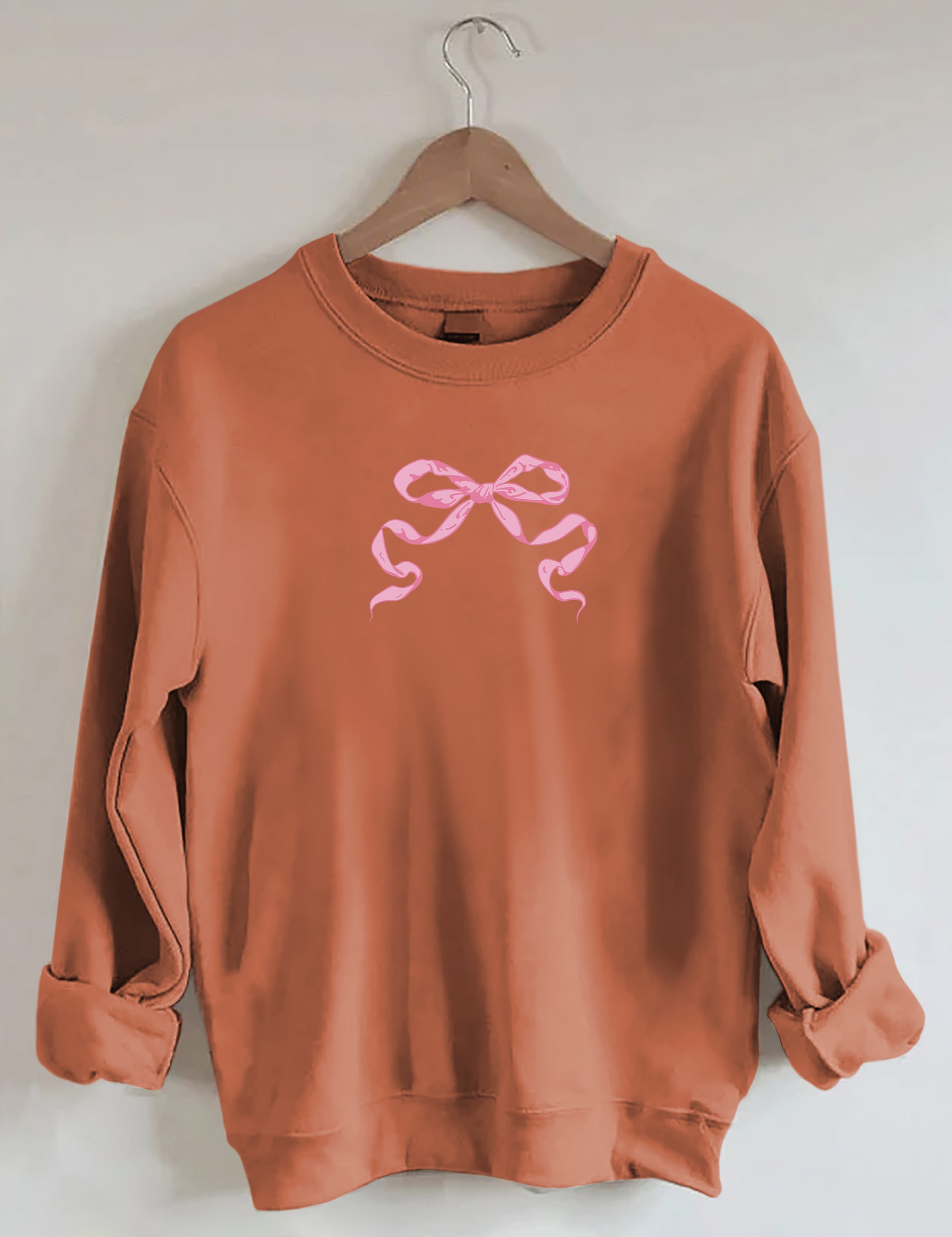 Sweat-shirt mignon avec nœud rose