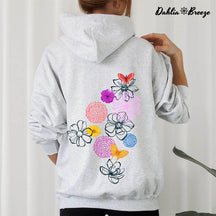 Sweat à capuche Doodle de fleurs aux contours floraux