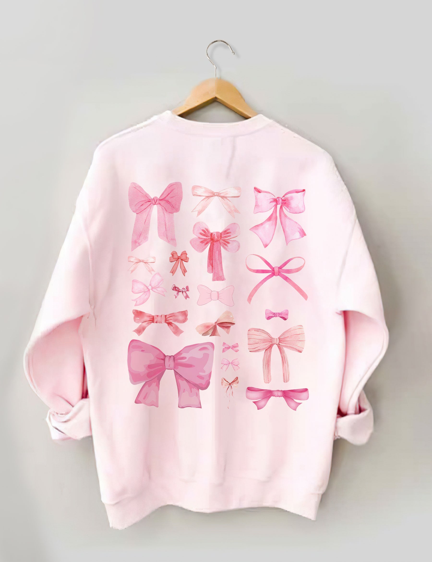 Sweat-shirt mignon avec nœud rose