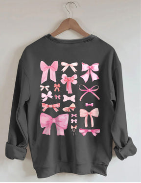 Sweat-shirt mignon avec nœud rose